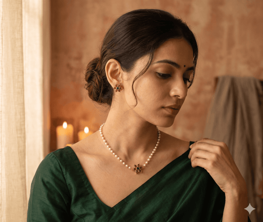 Elegant South Indian bridal necklace and earrings with floral design, paired with a green saree.