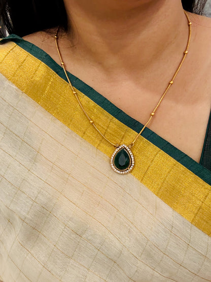 Meher Emerald Pendant Chain.